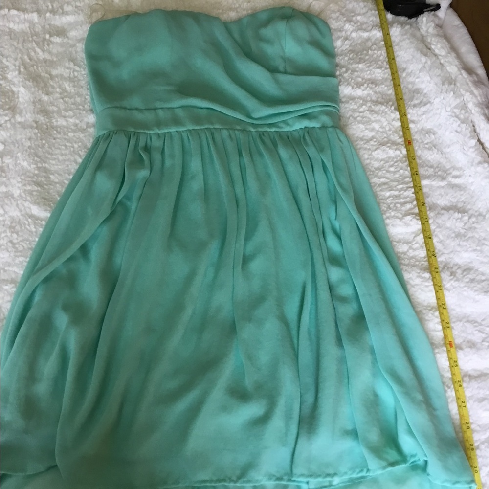 Strapless flowy mini dress.